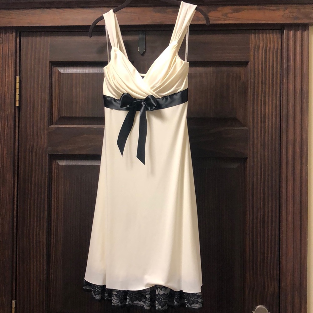 Ivory dress with black trim